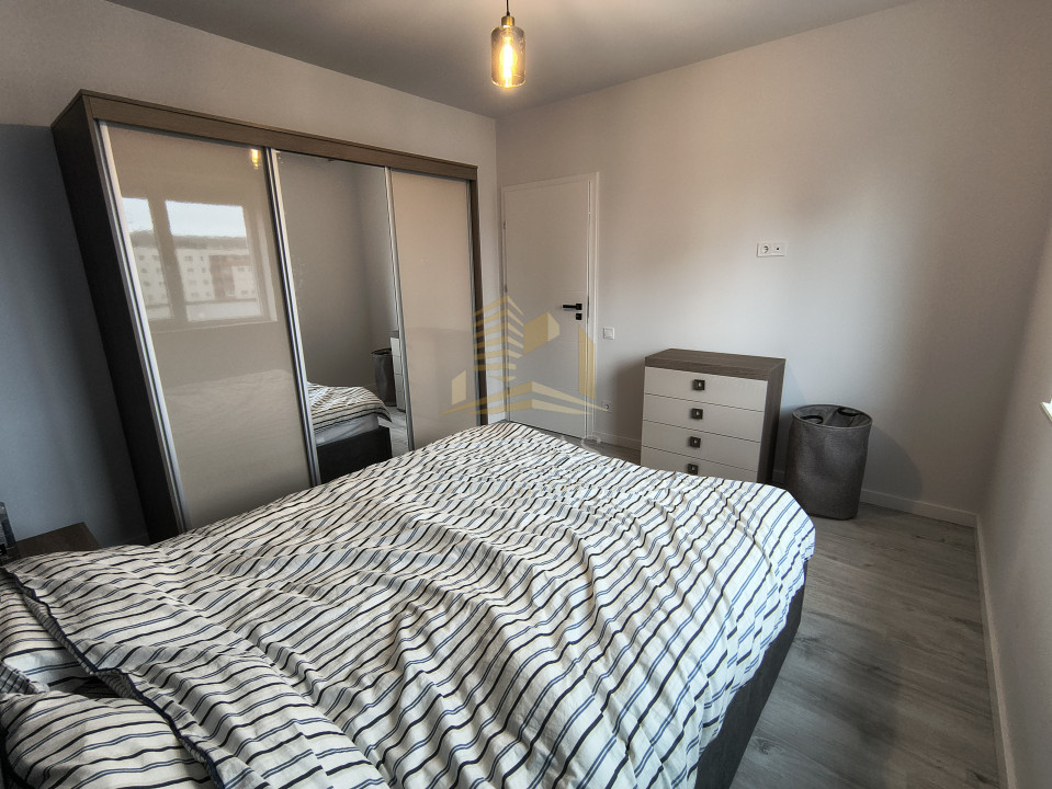 Apartament 2 camere decomandat | zona BMW | Parcare | Etaj intermediar